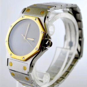 Rare Cartier Santos Octagonal Watch In
18k Gold And Stainless Steel!